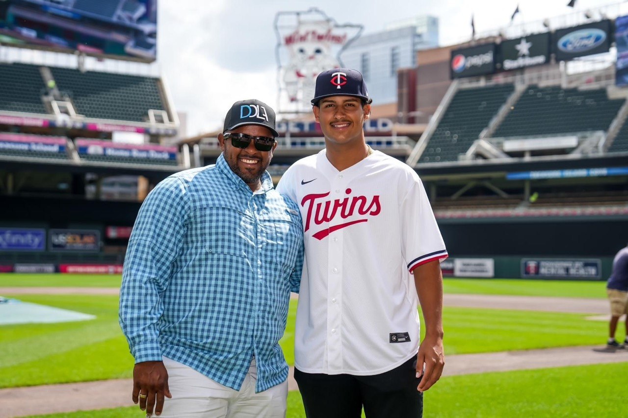 Coach Luis with the DDLA draftee at Target Field