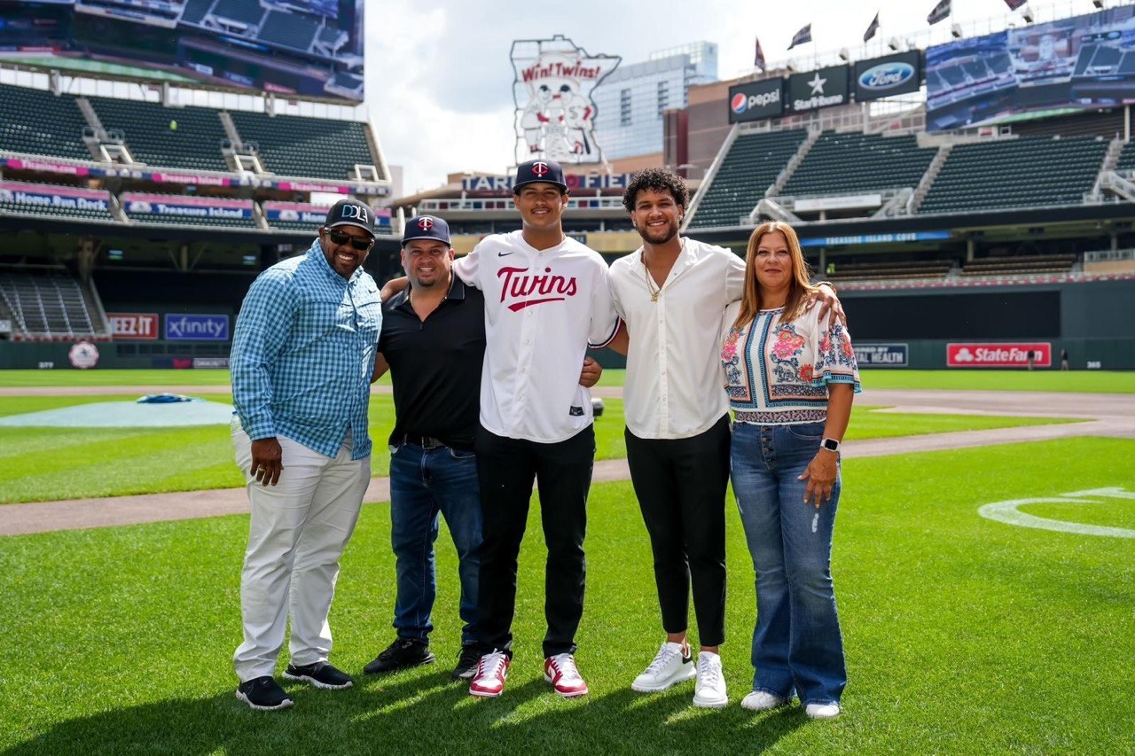 The DDLA draftee with family and Coach Luis at Target Field