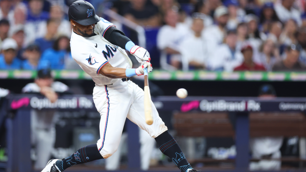 Otto Lopez making contact at the plate