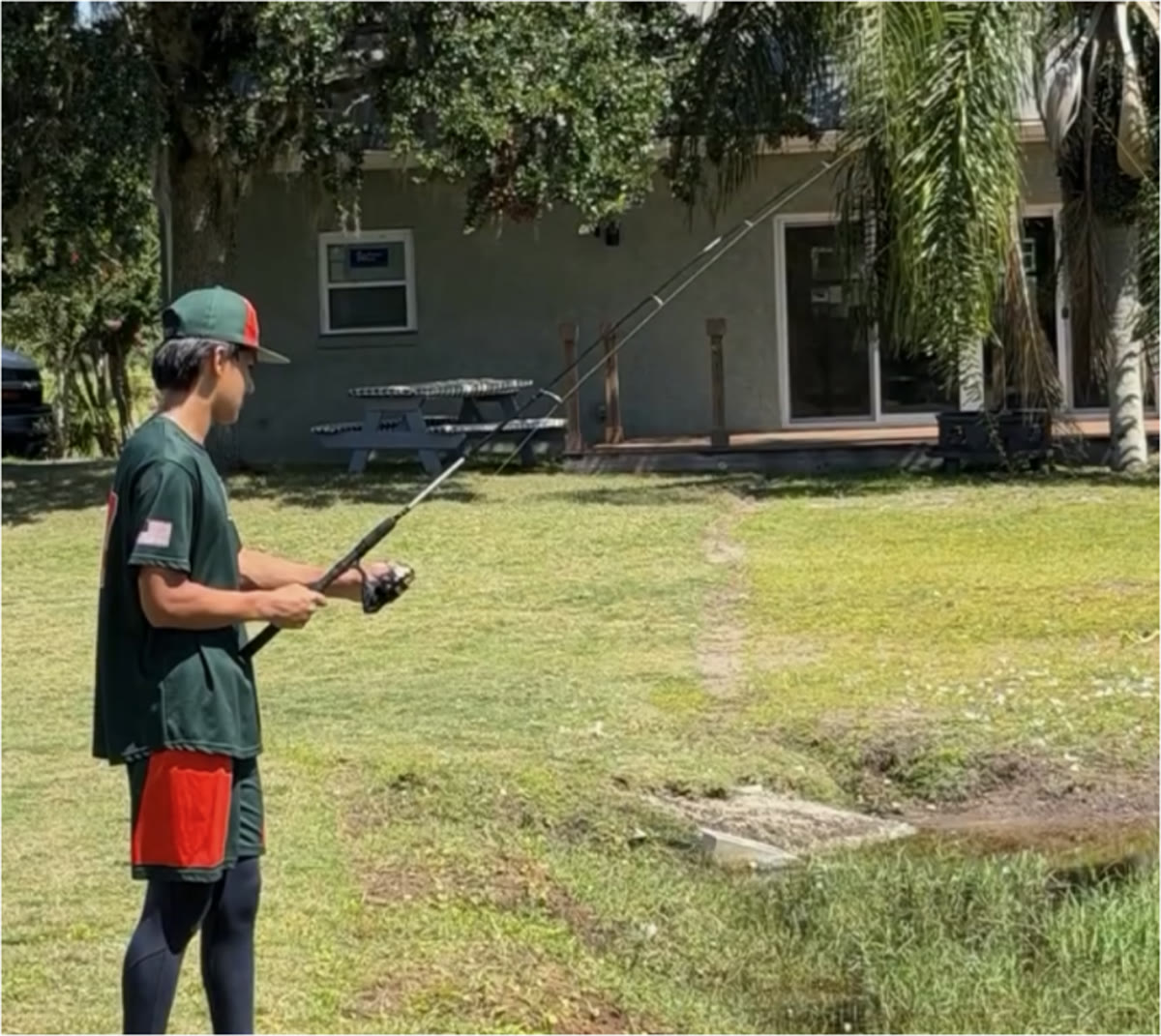 DDLA athlete fishing at the pond